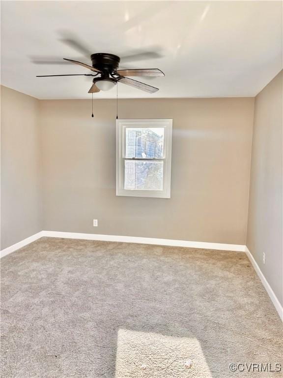 unfurnished room featuring carpet flooring and ceiling fan