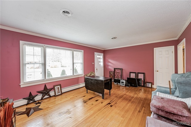 office with hardwood / wood-style floors, a baseboard radiator, a textured ceiling, and crown molding