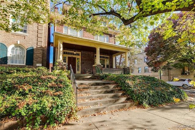 property entrance featuring covered porch