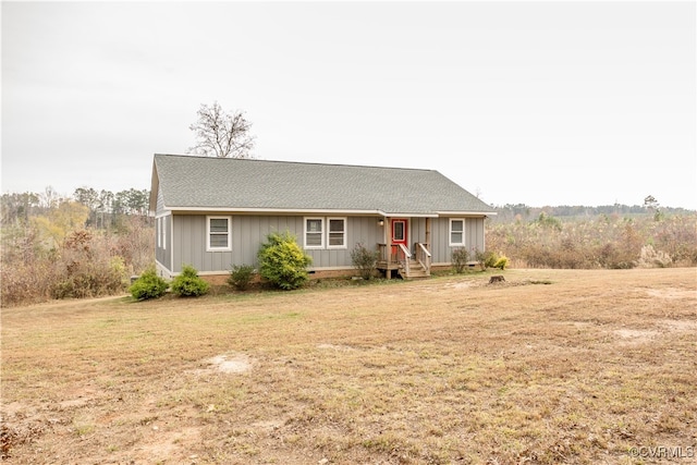 ranch-style house with a front lawn