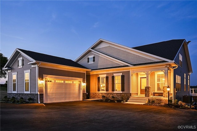 craftsman-style house featuring a garage