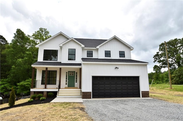 16159 W Patrick Henry Rd, Montpelier, VA 23192 - modern farmhouse style home featuring gravel driveway, a porch, a garage, board and batten siding, and roof with shingles
