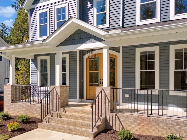 doorway to property with a porch