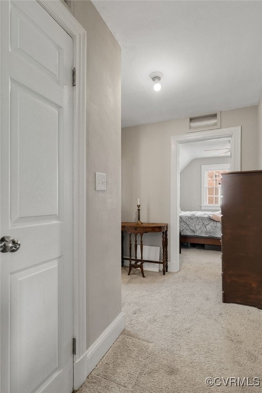 bedroom with light colored carpet