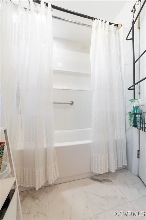 bathroom with vanity and shower / bath combo