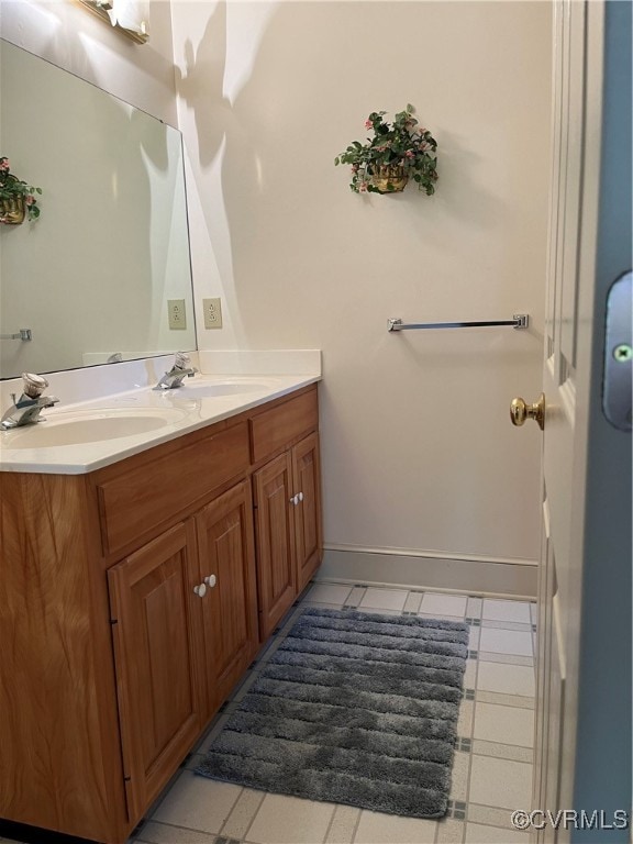 bathroom featuring vanity and tile patterned floors