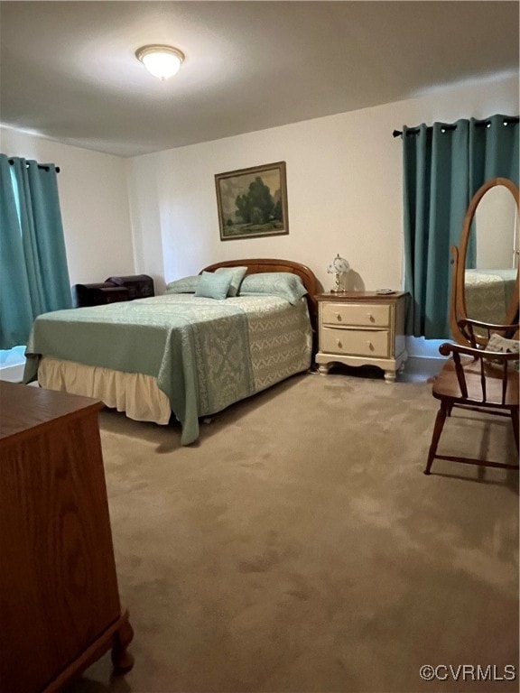 bedroom featuring carpet flooring