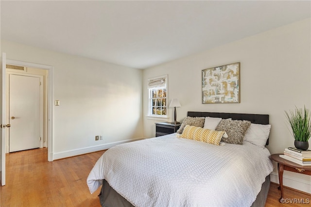 bedroom featuring light wood-type flooring