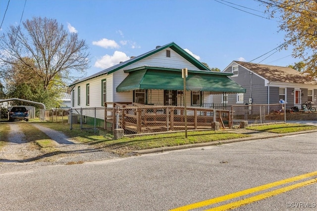 bungalow-style home featuring a carport