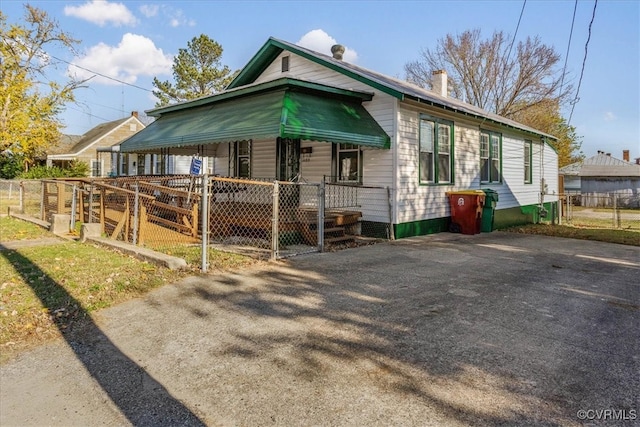 bungalow-style house featuring covered porch