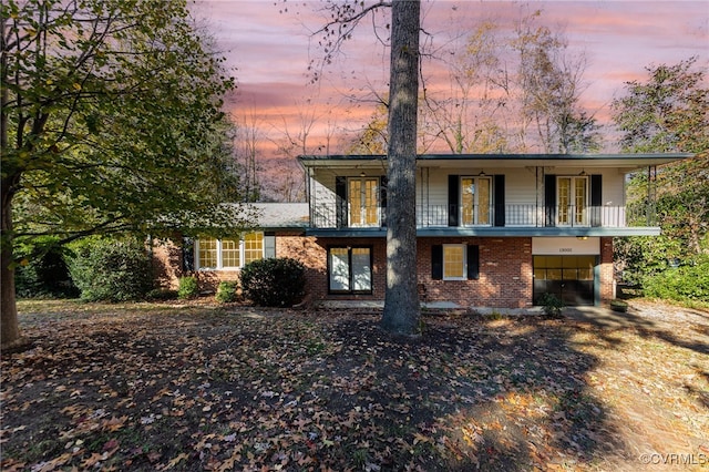 view of front of home with a balcony