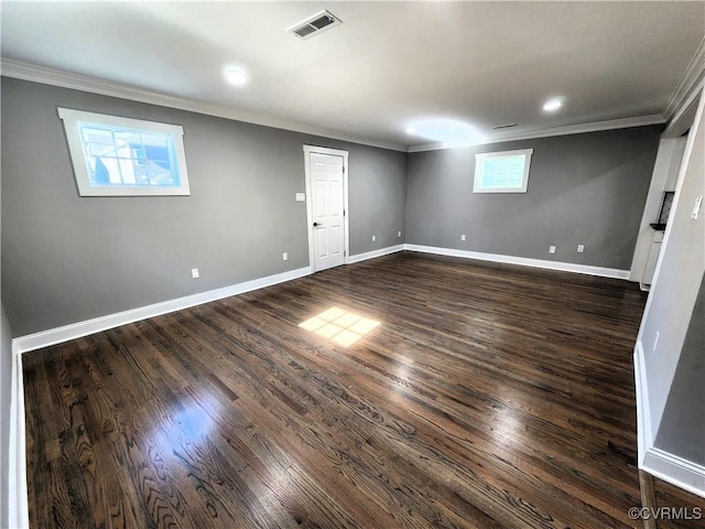 interior space featuring crown molding and dark hardwood / wood-style flooring