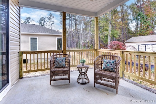 sunroom with wood ceiling