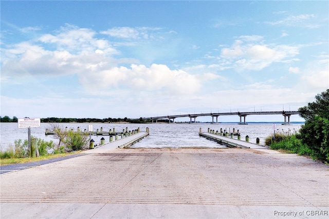 dock area featuring a water view