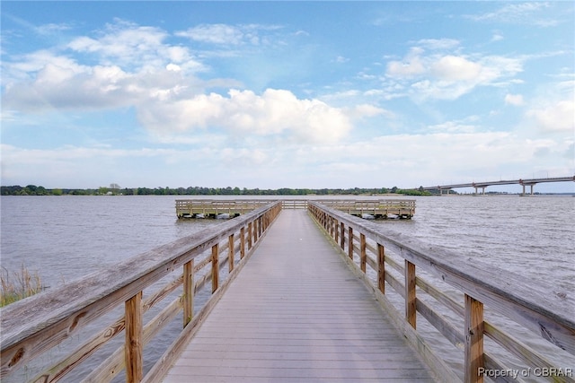 view of dock with a water view