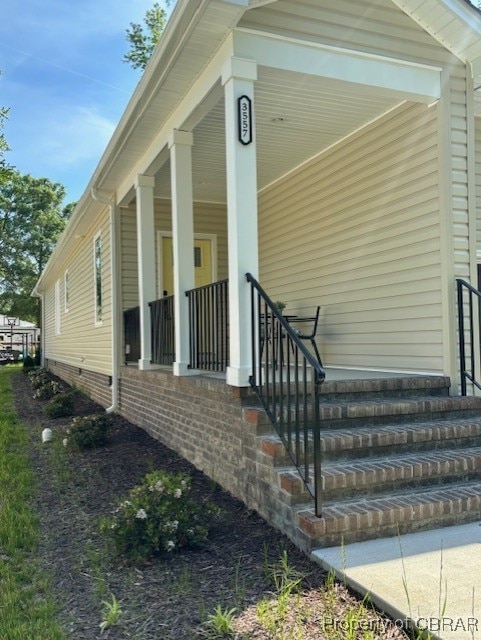 3557 Odi St, West Point, VA 23181 - entrance to property featuring a porch and crawl space