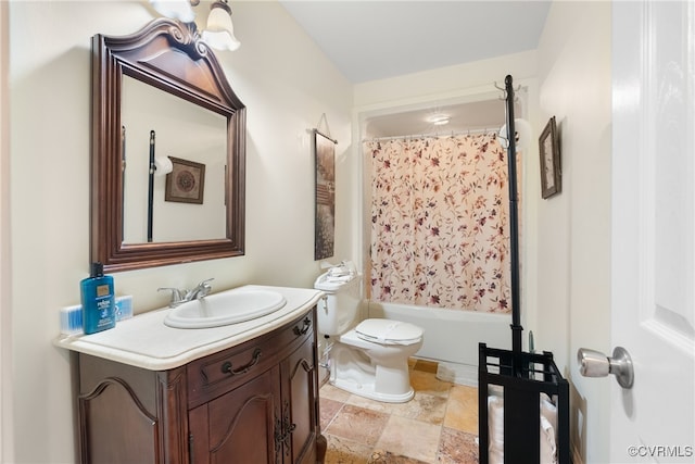 full bathroom with shower / bath combo, vanity, and toilet