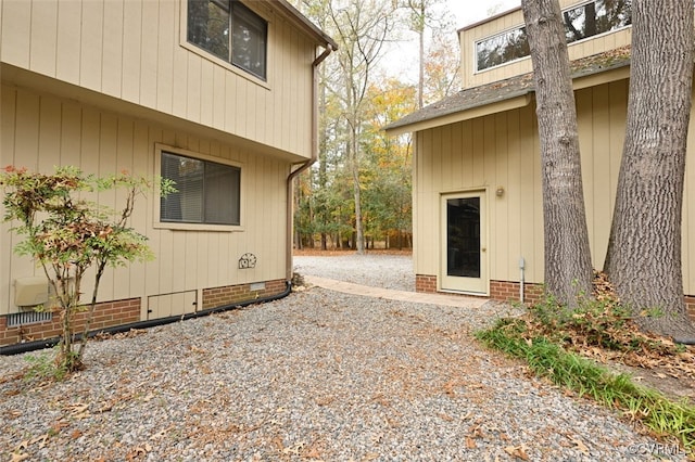 view of side of home featuring a patio