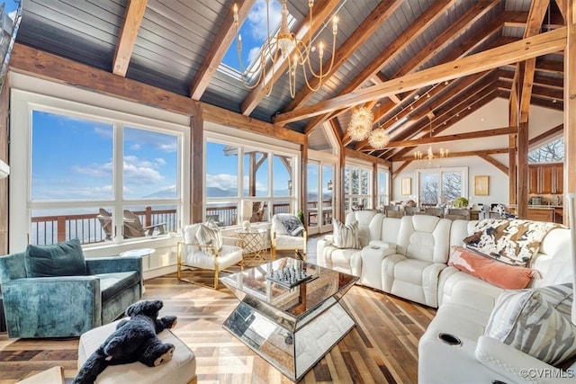 sunroom / solarium with vaulted ceiling with beams, a water view, wood ceiling, and an inviting chandelier