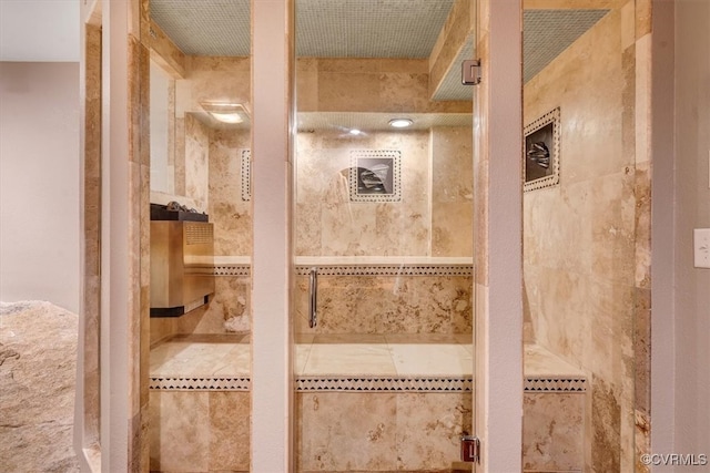 bathroom featuring tiled shower