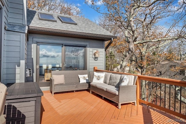 wooden terrace featuring an outdoor living space