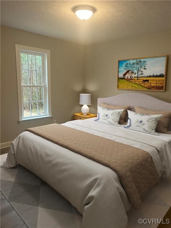 bedroom with a textured ceiling