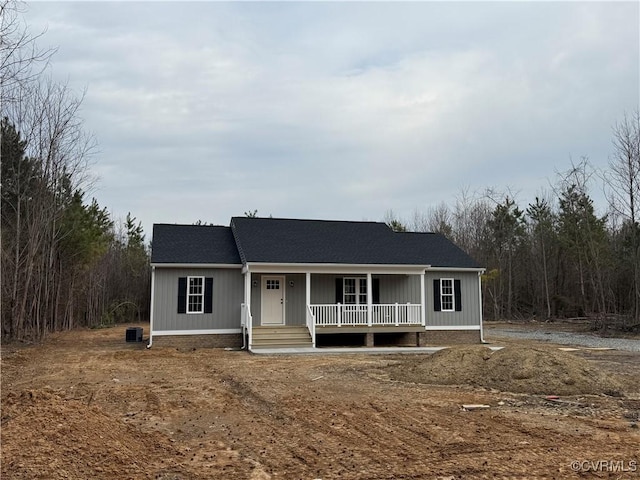 ranch-style home with covered porch