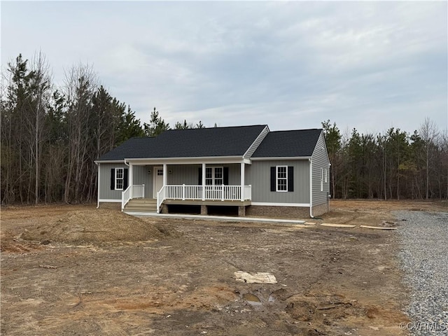 single story home with a porch