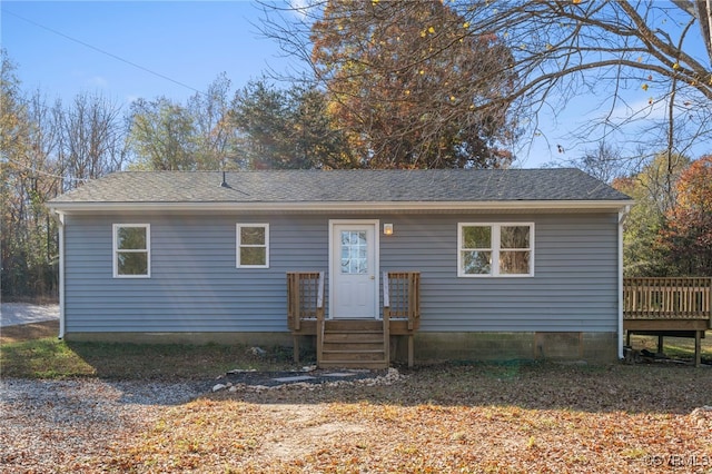 view of front of house with a deck