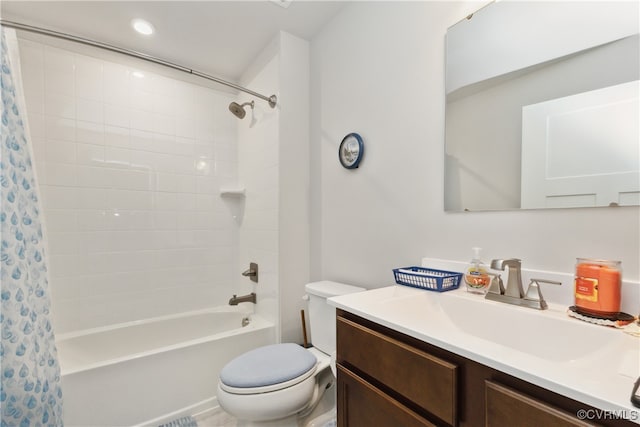 full bathroom featuring vanity, toilet, and shower / tub combo