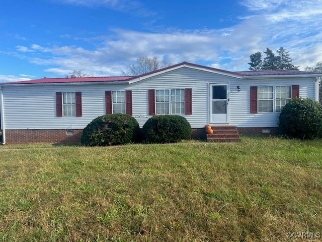 view of front of home with a front yard