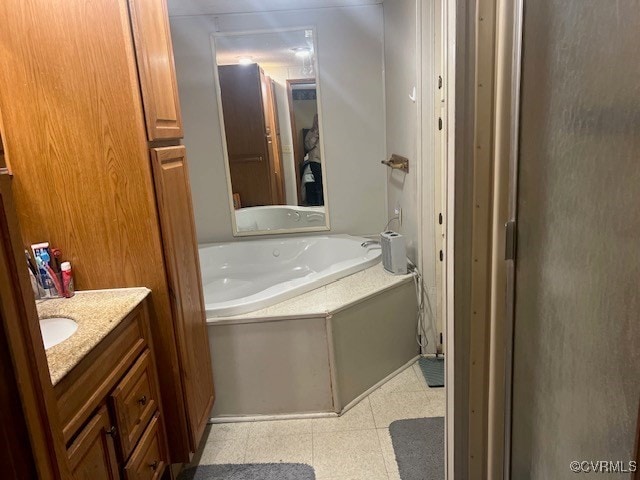 bathroom featuring vanity and a tub