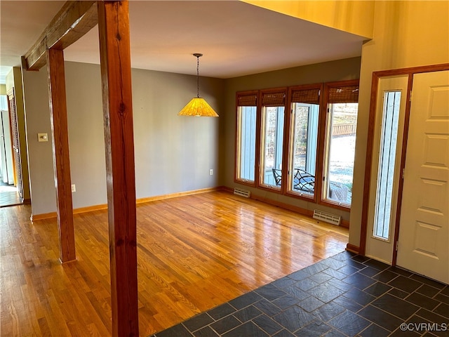 entrance foyer featuring dark hardwood / wood-style floors