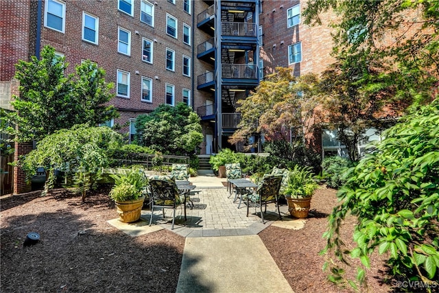 view of property's community featuring a patio