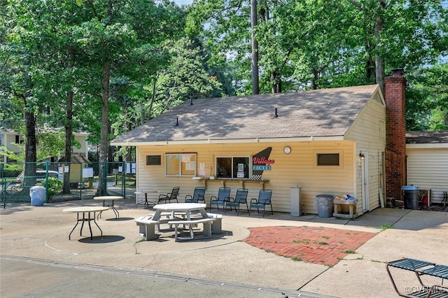 rear view of property with a patio area