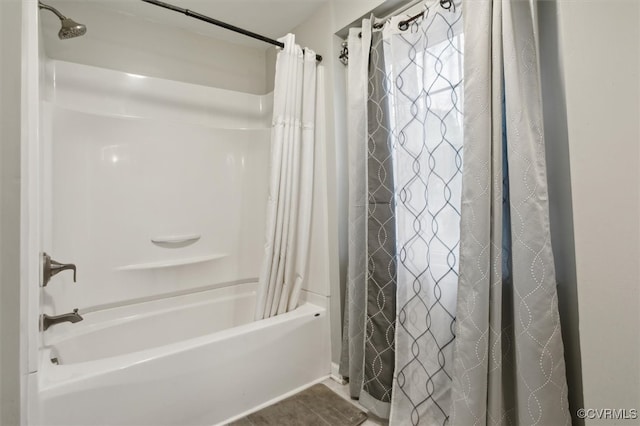 bathroom featuring shower / bathtub combination with curtain