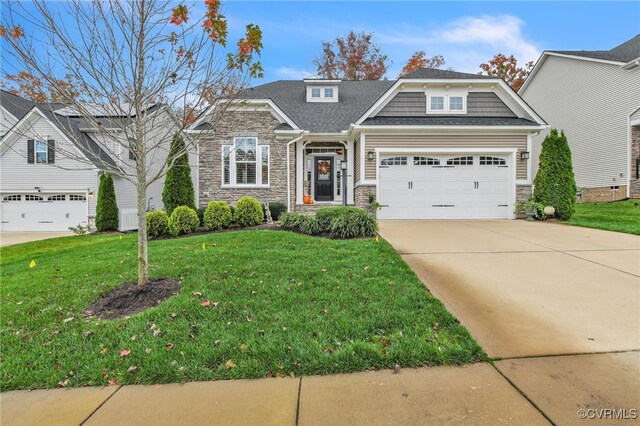 view of front facade with a garage and a front lawn