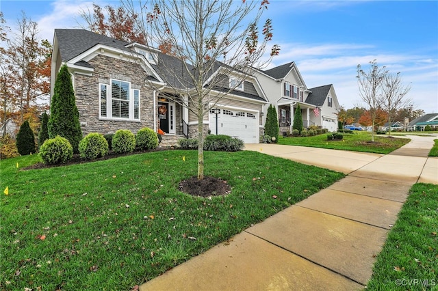 craftsman inspired home featuring a garage and a front lawn