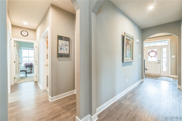 foyer entrance with light wood-type flooring