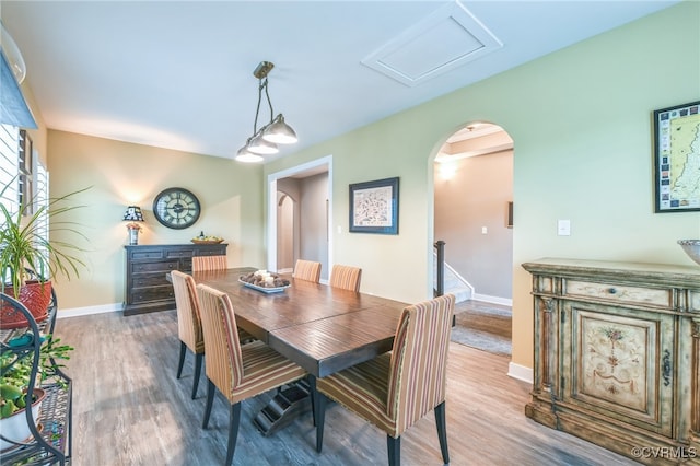 dining space featuring hardwood / wood-style flooring