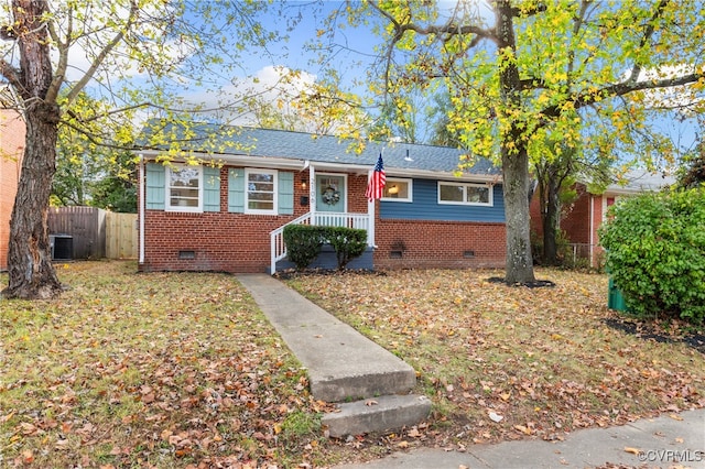 single story home featuring central AC unit