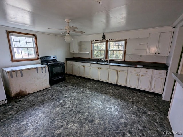 kitchen with white cabinetry, black range with electric stovetop, sink, and a wealth of natural light