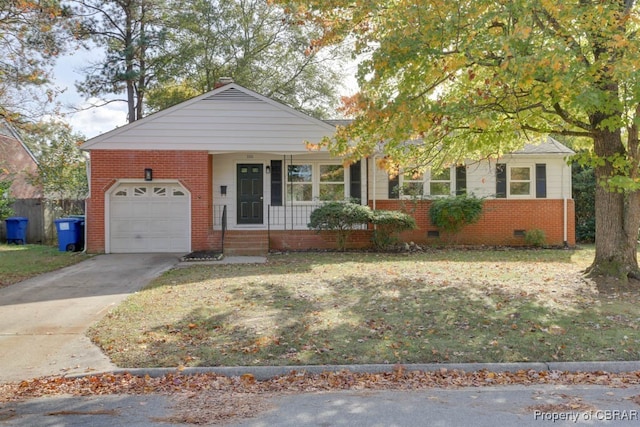 view of front of house with covered porch, a front yard, and a garage