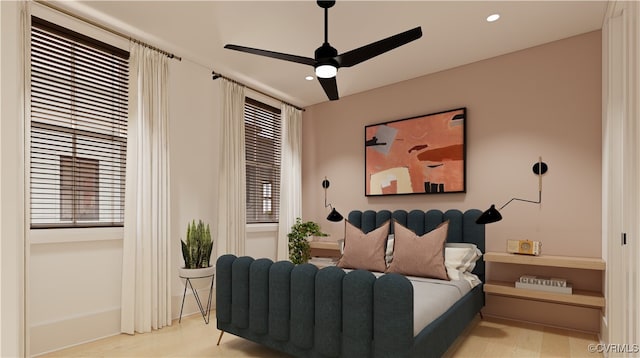 bedroom featuring light wood-style flooring, a ceiling fan, and recessed lighting