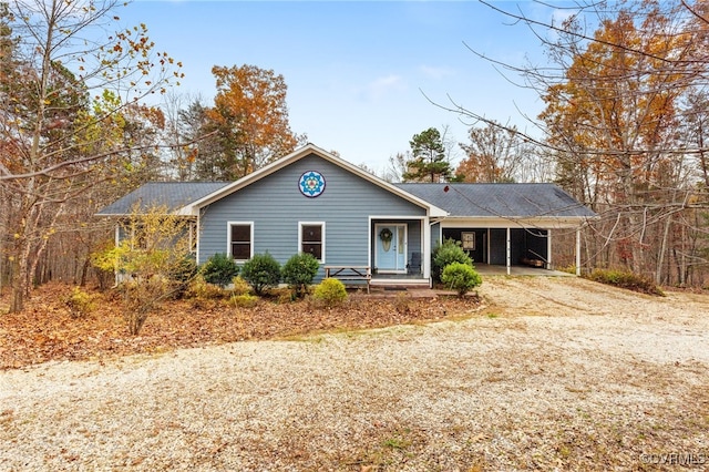 ranch-style house with a carport