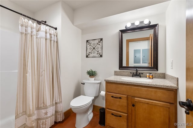 bathroom featuring vanity and toilet