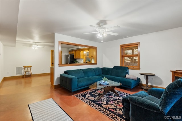 living room featuring ceiling fan