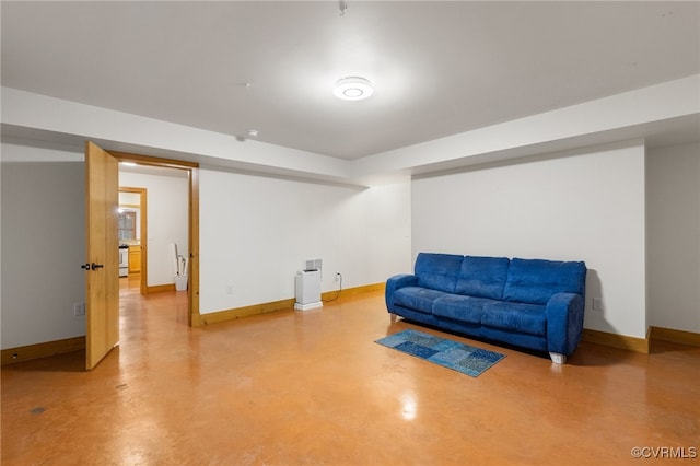 sitting room with concrete flooring