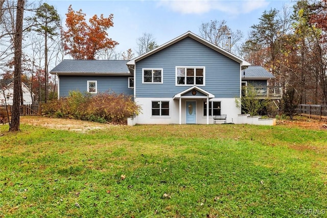 front of property featuring a front lawn