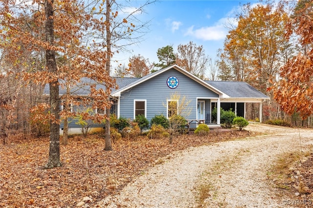 ranch-style house featuring a porch